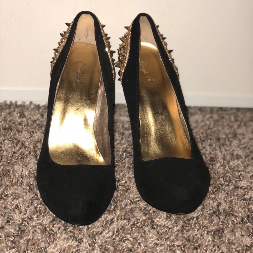 Black and gold studded heels
